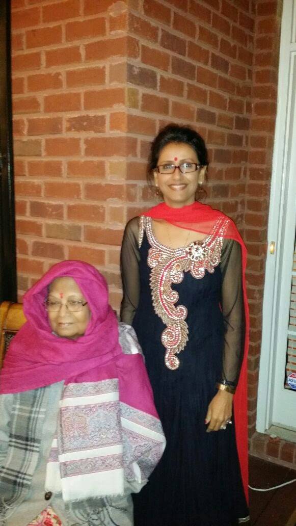 Sitting outside my home on Malvika's birthday, 24 October 2014